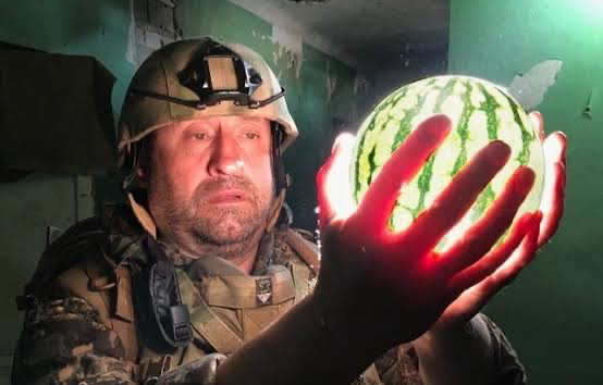 Soldier holding glowing watermelon Blank Meme Template