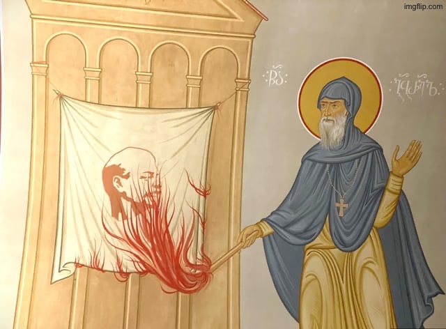 Saint Gabriel Urgebadze burns a portrait of Vladimir Lenin. Full title in the comments | image tagged in lenin,saint,based,communism,communists,christian | made w/ Imgflip meme maker