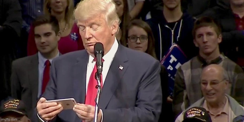 Trump looking at phone | image tagged in trump looking at phone | made w/ Imgflip meme maker