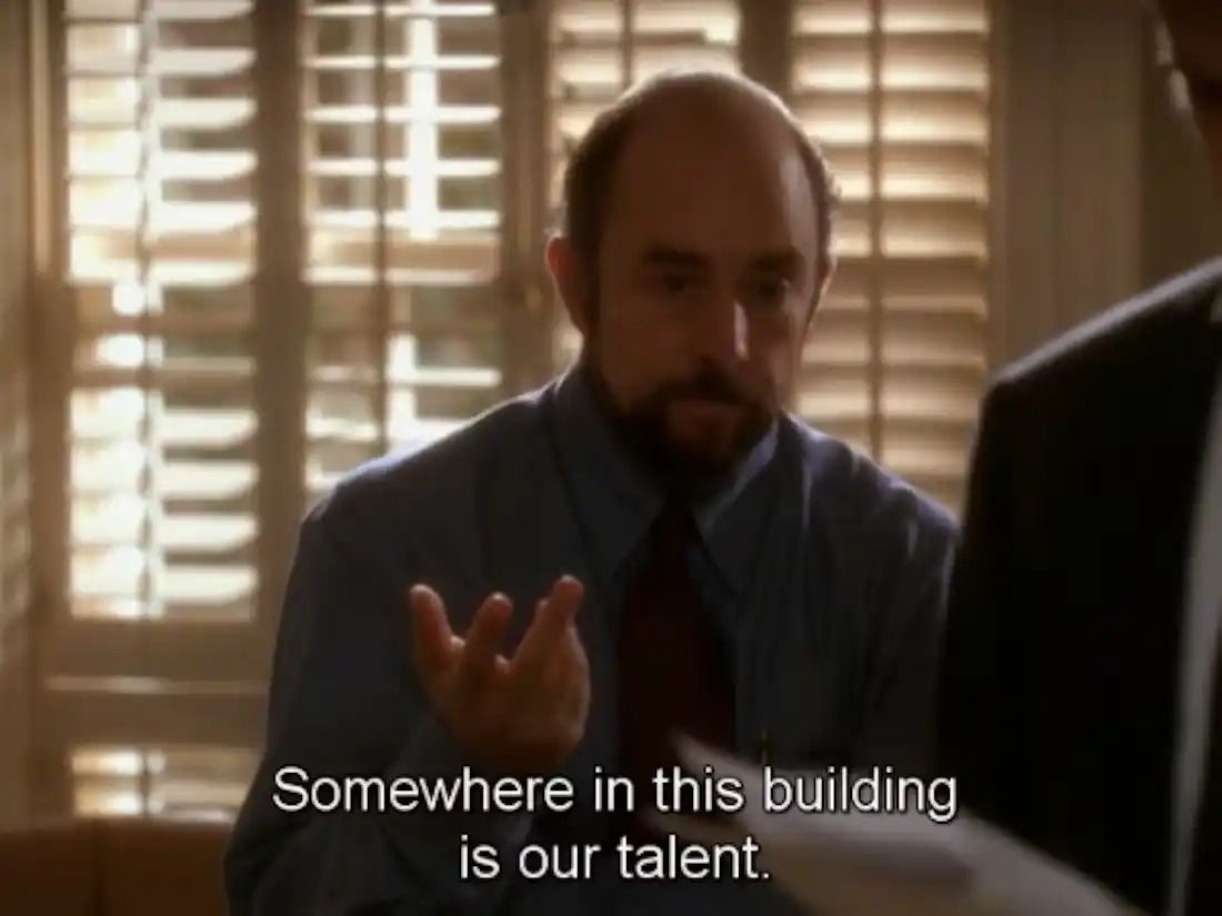 Somewhere in this building is our talent Blank Meme Template