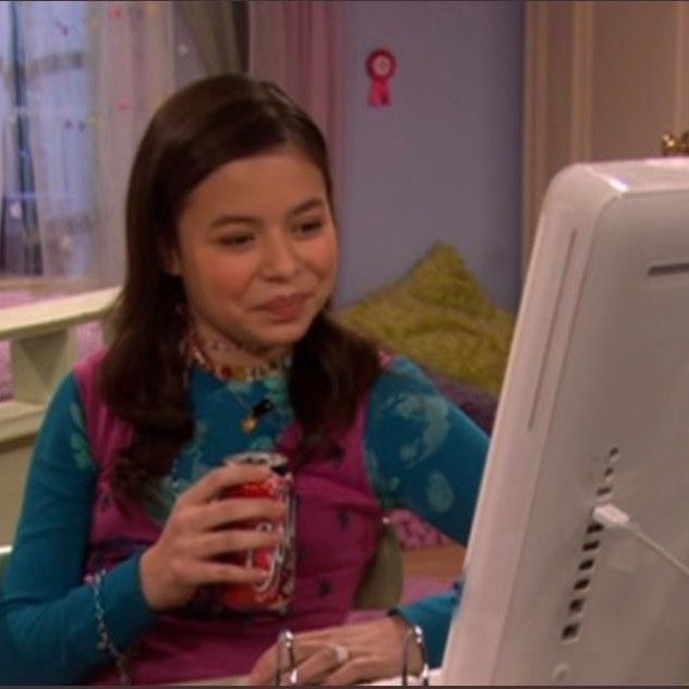 Girl smiling in front of computer Blank Meme Template