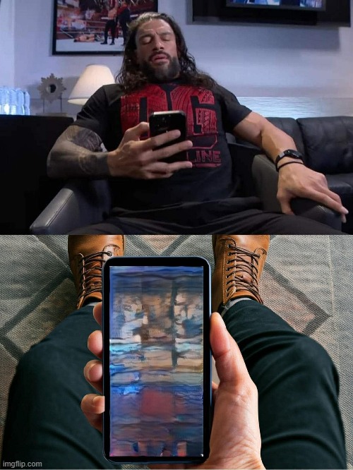 Roman Reigns phone | image tagged in wwe,telefon | made w/ Imgflip meme maker
