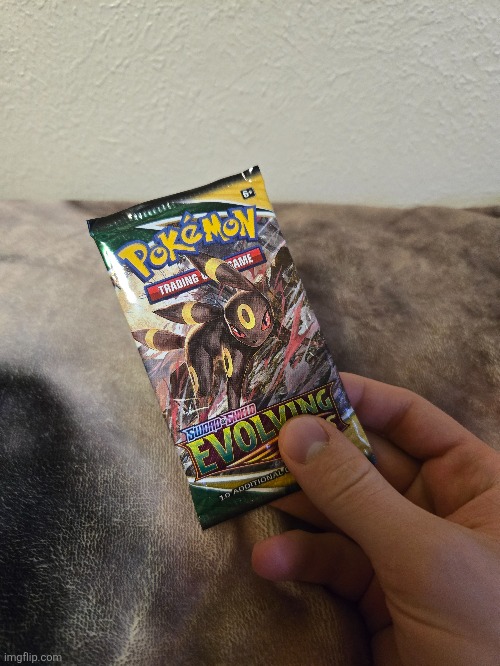I hate wondering what could be in my unopened Evolving Skies pack | image tagged in pokemon,pokemon cards,evolving skies,umbreon,sealed,mystery | made w/ Imgflip meme maker
