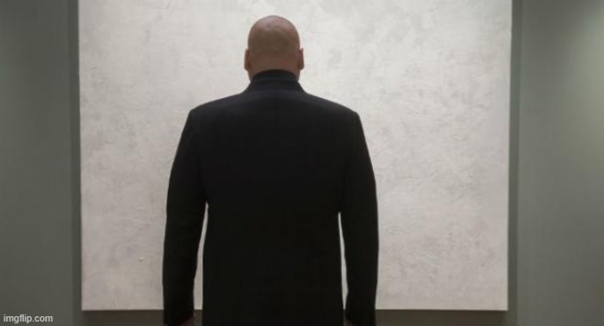 Don't mind me, just contemplating life.... | image tagged in daredevil mr fist looking on white painting | made w/ Imgflip meme maker