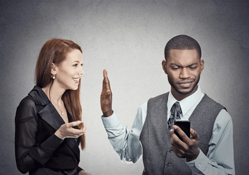 Guy looking at Phone and ignoring woman Blank Meme Template