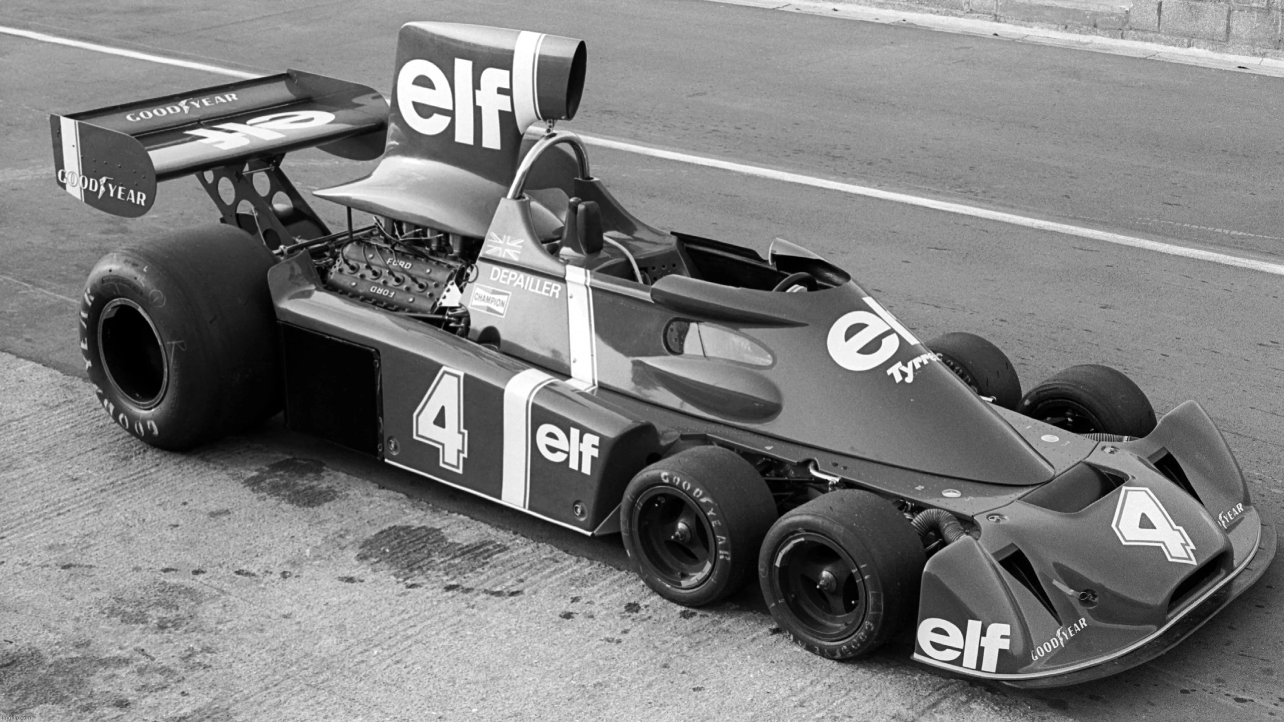 Tyrrell 6-Wheels? What The...: Before Covini C6W | image tagged in tyrrell 6-wheels f1 car,f1 | made w/ Imgflip meme maker