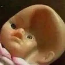 Baby doll with caved in head Blank Meme Template