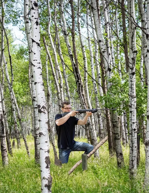 Gunman crouched Blank Meme Template