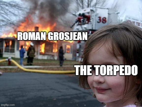 fire | roman grosjean; the torpedo | image tagged in memes,disaster girl | made w/ Imgflip meme maker