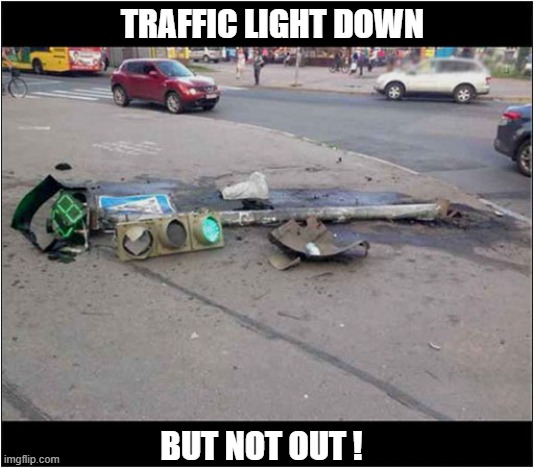 Remains Undefeated | Traffic light down; but not out ! | image tagged in traffic light,down,not out | made w/ Imgflip meme maker