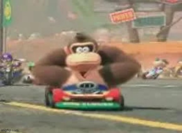donkey kong driving | image tagged in donkey kong driving | made w/ Imgflip meme maker