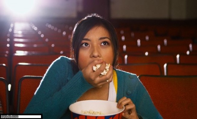 image tagged in girl eating popcorn | made w/ Imgflip meme maker