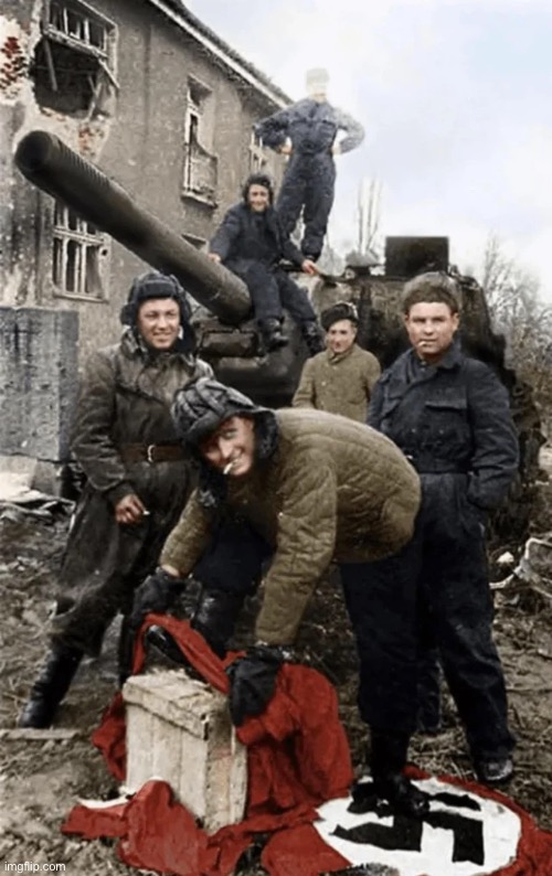 anti-fascist soldiers step on the Nazi flag, 1945 | image tagged in ww2,nazi,nazis,world war 2 | made w/ Imgflip meme maker