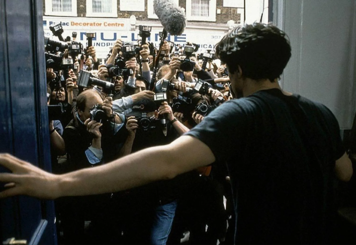 Dude surrounded by cameras Blank Meme Template