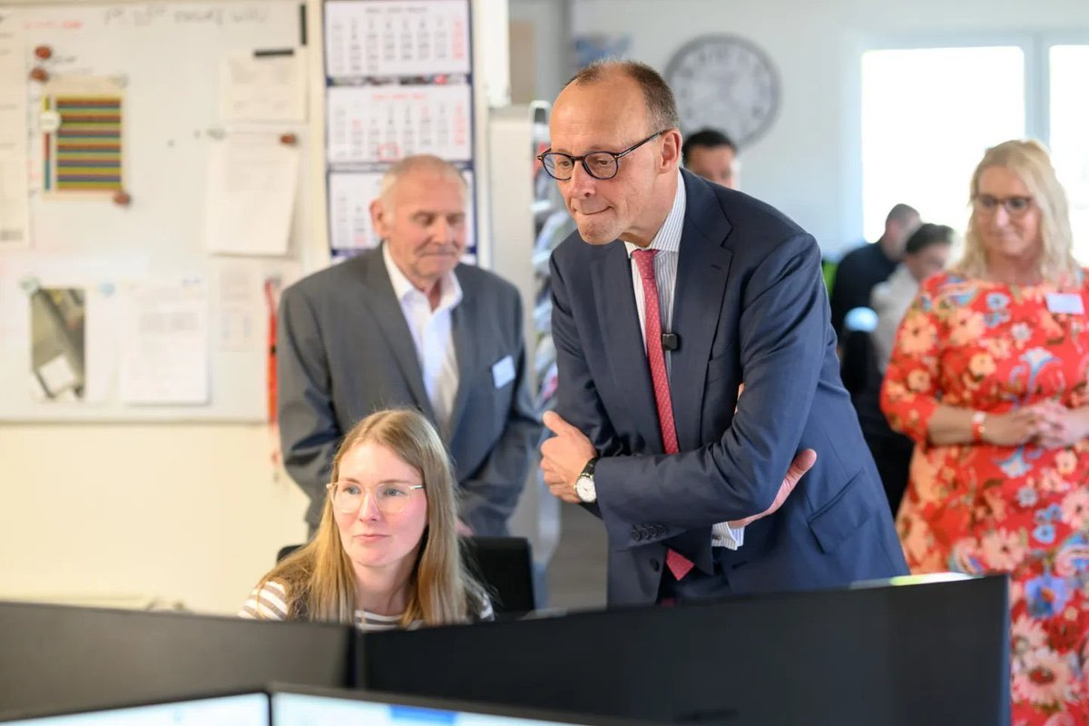 Friedrich Merz looking at a computer Blank Meme Template