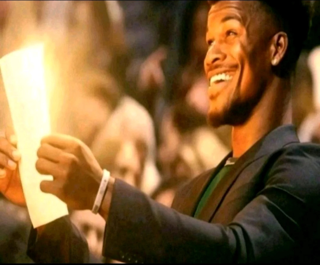 Guy holding glowing paper Blank Meme Template