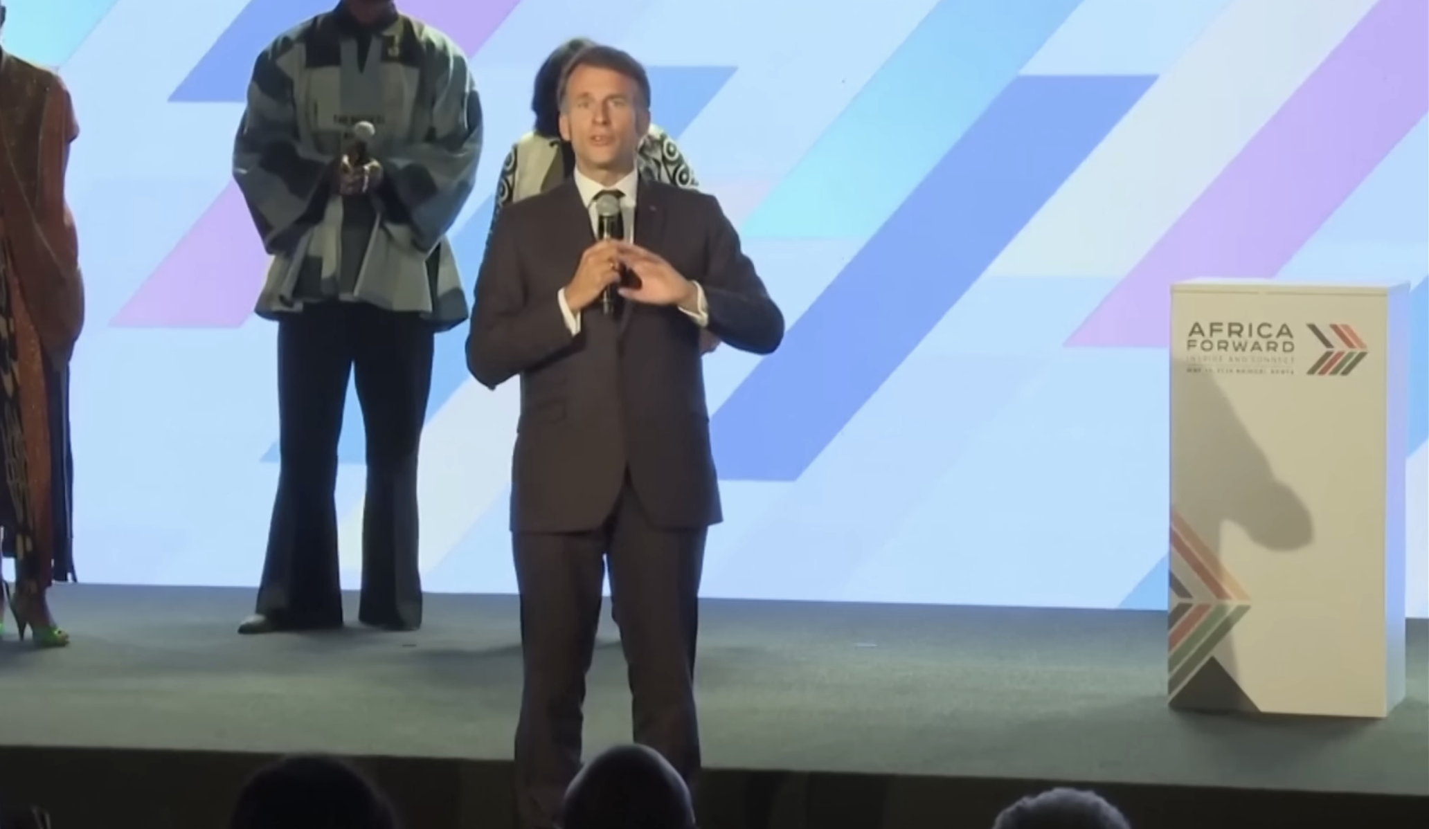 Macron on Stage Blank Meme Template