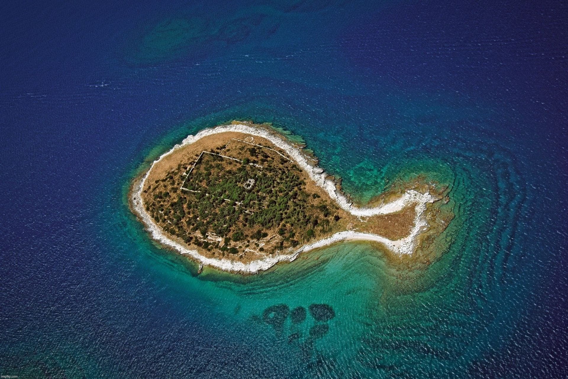 fih island that I got from windows random lock screen wallpapers of places | made w/ Imgflip meme maker