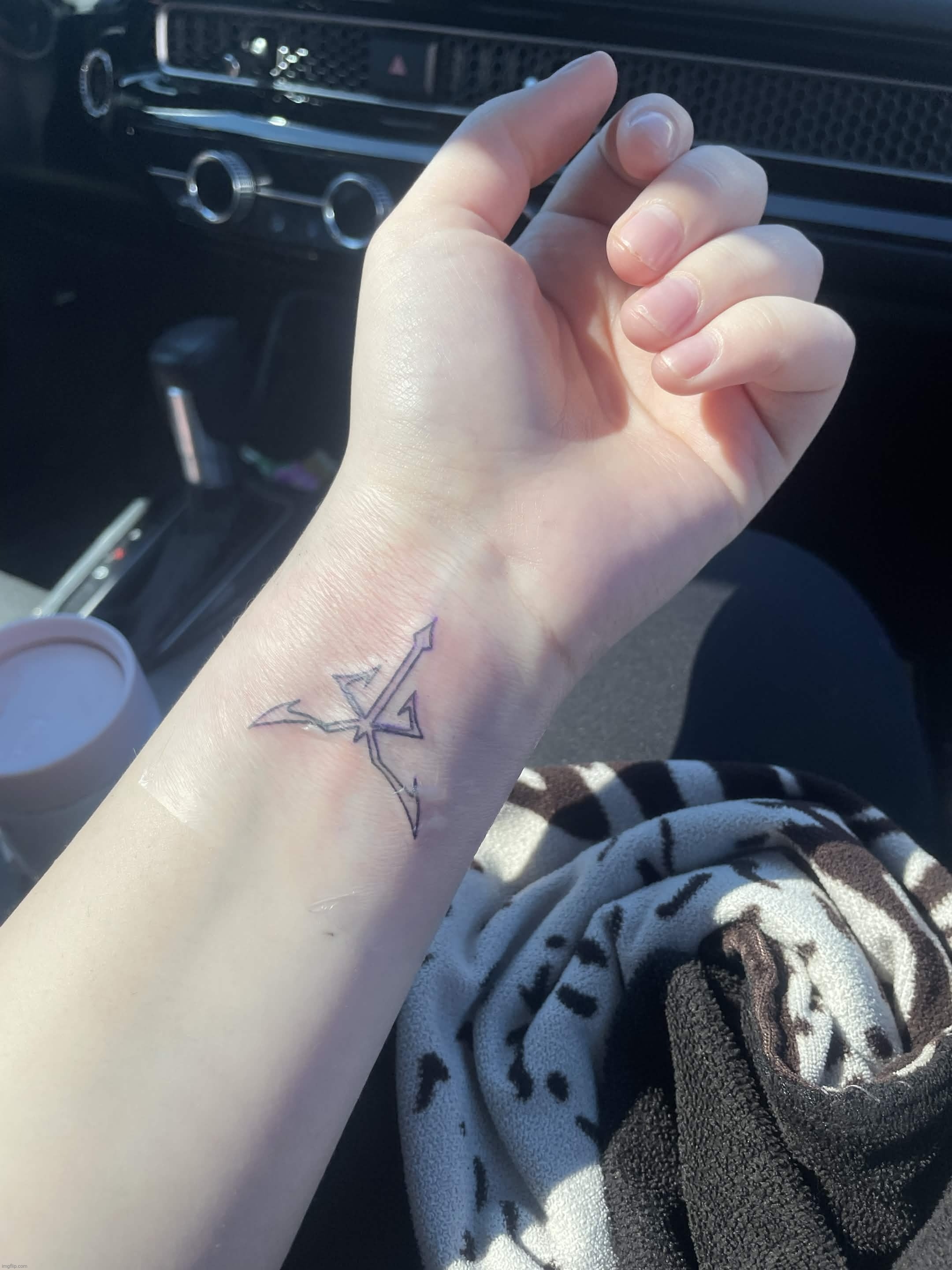 First tattoo, wanted something simple, so Las Plagas insignia from RE IV | made w/ Imgflip meme maker