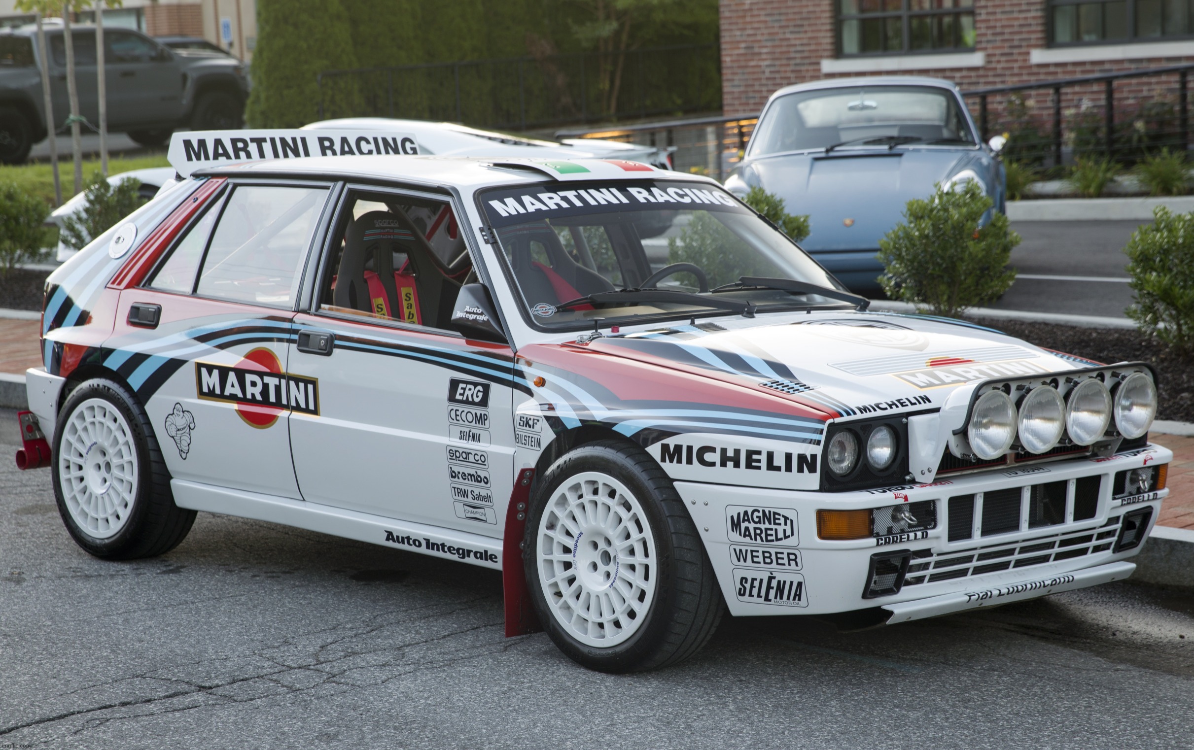 Lancia Delta HF Integrale: 0-100 5.7 Seconds | image tagged in lancia delta hf integrale,rally,lancia | made w/ Imgflip meme maker