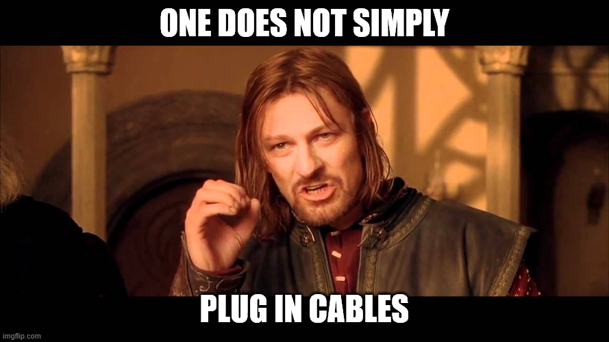 Walk Into Mordor | One does not simply; plug in cables | image tagged in walk into mordor | made w/ Imgflip meme maker