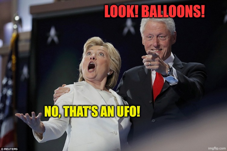Hillary Clinton looking at balloons | Look! Balloons! No, that's an Ufo! | image tagged in hillary clinton looking at balloons | made w/ Imgflip meme maker