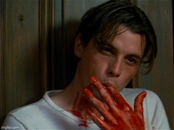 image tagged in licking bloody fingers | made w/ Imgflip meme maker