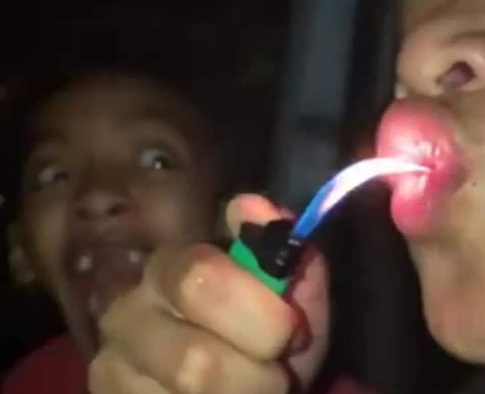 Man eating fire while friend is screaming Blank Meme Template