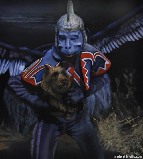 Flying Monkey Holding Little Doggie | image tagged in ebola flying monkey wizard of oz,flying monkey,witch of the west,ill get you my pretty,your little dog too,toto | made w/ Imgflip meme maker