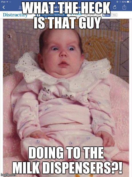 It does a baby good... | WHAT THE HECK IS THAT GUY DOING TO THE MILK DISPENSERS?! | image tagged in photos,baby,milk,funny | made w/ Imgflip meme maker