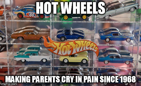 It's dark and you step in fear! | HOT WHEELS MAKING PARENTS CRY IN PAIN SINCE 1968 | image tagged in toy,cars,parenting,parents | made w/ Imgflip meme maker