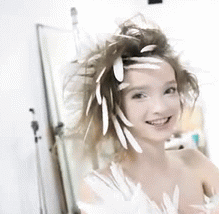 Elena - Smiley Feathers | image tagged in gifs,elena sartison,smile,feathers,model,beautiful | made w/ Imgflip video-to-gif maker