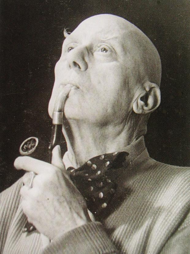 High Quality Aleister Crowley smokes and contemplates Blank Meme Template