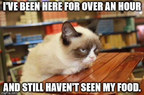 Grumpy Cat Table Meme | I'VE BEEN HERE FOR OVER AN HOUR AND STILL HAVEN'T SEEN MY FOOD. | image tagged in memes,grumpy cat table | made w/ Imgflip meme maker