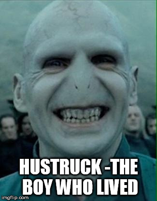 Voldemort Grin | HUSTRUCK -THE BOY WHO LIVED | image tagged in voldemort grin | made w/ Imgflip meme maker