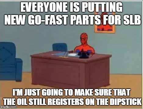 Spiderman Computer Desk Meme | EVERYONE IS PUTTING NEW GO-FAST PARTS FOR SLB I'M JUST GOING TO MAKE SURE THAT THE OIL STILL REGISTERS ON THE DIPSTICK | image tagged in memes,spiderman computer desk,spiderman | made w/ Imgflip meme maker