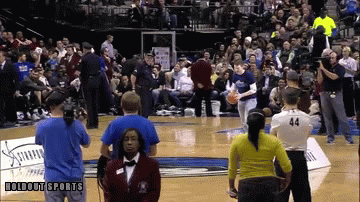 Mavericks fan hits half-court shot, wins big screen TV (Video)