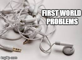 The tangled earphone struggle | FIRST WORLD PROBLEMS | image tagged in first world problems | made w/ Imgflip meme maker