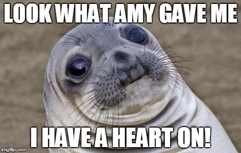 When I was a teenager my girlfriend gave a sticker in a valentine's day card. I put it on my jacket and showed her mom.  | LOOK WHAT AMY GAVE ME I HAVE A HEART ON! | image tagged in memes,awkward moment sealion | made w/ Imgflip meme maker