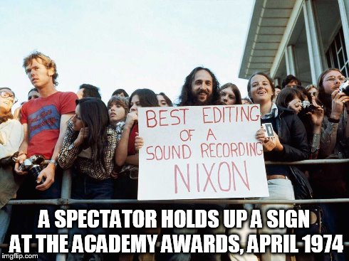 A SPECTATOR HOLDS UP A SIGN AT THE ACADEMY AWARDS, APRIL 1974 | made w/ Imgflip meme maker