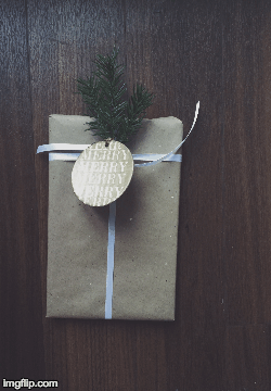 Holiday Wrapping | image tagged in gifs | made w/ Imgflip images-to-gif maker