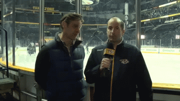 Predators broadcaster hit in head with puck while filming (Video / GIF)