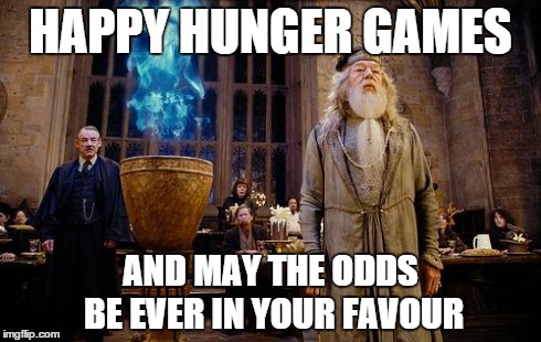 HAPPY HUNGER GAMES AND MAY THE ODDS BE EVER IN YOUR FAVOUR | image tagged in the goblet of fire | made w/ Imgflip meme maker