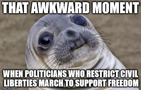 Awkward Moment Sealion | THAT AWKWARD MOMENT WHEN POLITICIANS WHO RESTRICT CIVIL LIBERTIES MARCH TO SUPPORT FREEDOM | image tagged in memes,awkward moment sealion | made w/ Imgflip meme maker