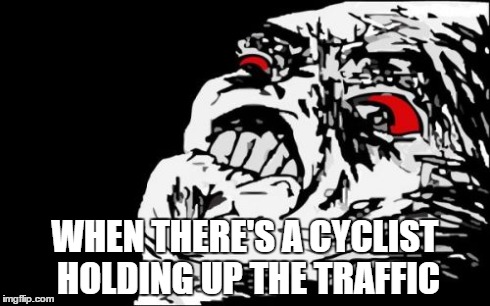Mega Rage Face | WHEN THERE'S A CYCLIST HOLDING UP THE TRAFFIC | image tagged in memes,mega rage face | made w/ Imgflip meme maker