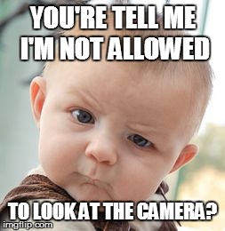 Skeptical Baby | YOU'RE TELL ME I'M NOT ALLOWED TO LOOK AT THE CAMERA? | image tagged in memes,skeptical baby | made w/ Imgflip meme maker