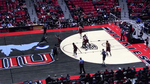 NIU center Pete Rakocevic takes down the hoop | image tagged in gifs | made w/ Imgflip video-to-gif maker