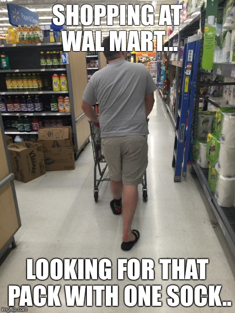 SHOPPING AT WAL MART... LOOKING FOR THAT PACK WITH ONE SOCK.. | image tagged in walmart,funny,socks and sandals | made w/ Imgflip meme maker