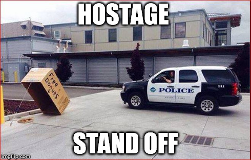 Nothing could be Cruller. | HOSTAGE STAND OFF | image tagged in donuts,cops | made w/ Imgflip meme maker