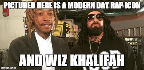 wizdow changing the game! | PICTURED HERE IS A MODERN DAY RAP ICON AND WIZ KHALIFAH | image tagged in wiz khalifah,damien sandow,damien wizdow,wrestling,funny meme | made w/ Imgflip meme maker